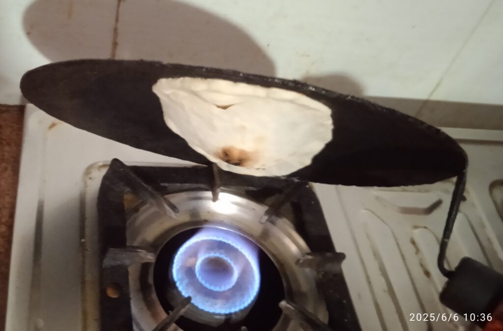 Open flame cooking naan